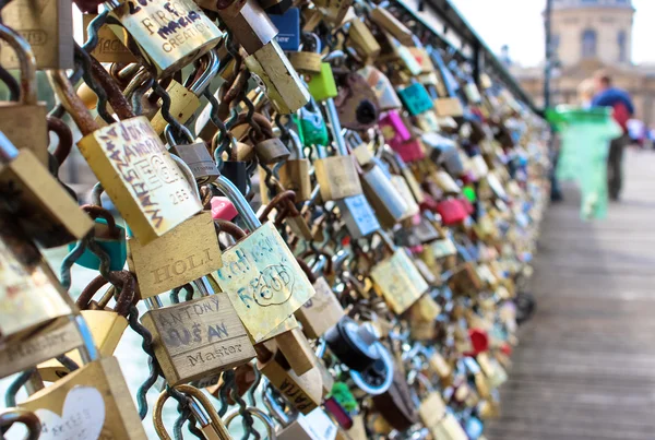 Love padlocks on the bridge Pont des Arts across river Seine in Paris, France.France Paris Ponts-des-Arts