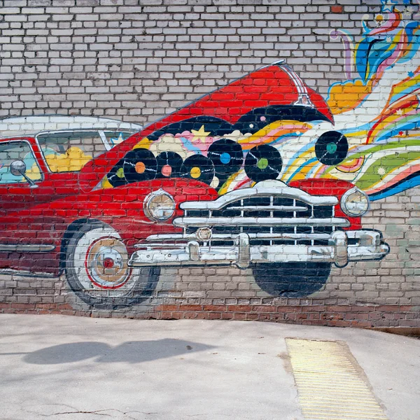 Graffiti of car on brick wall, Moscow, Russia