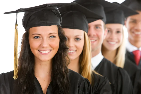 Graduation: Female Graduate Leads Line of Students — Stock Photo #24209831
