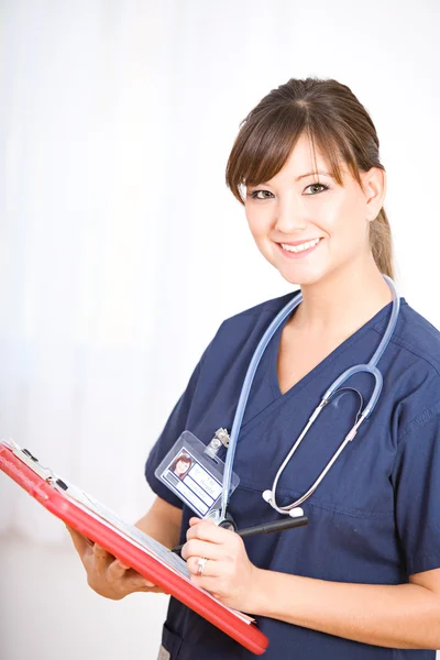 Nurse: Cheerful Nurse with Clipboard