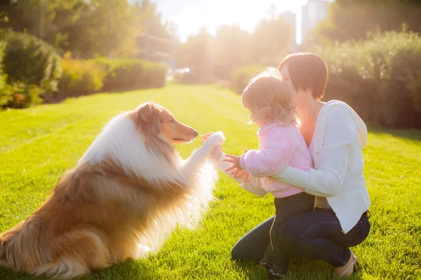 Happy family with the dog