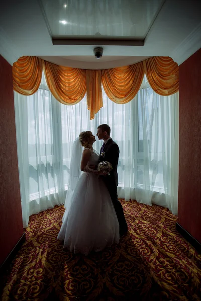 Silhouette of the couple in the room
