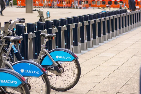 LONDON - SEPT 28: Row of hire bikes lined up in a docking statio