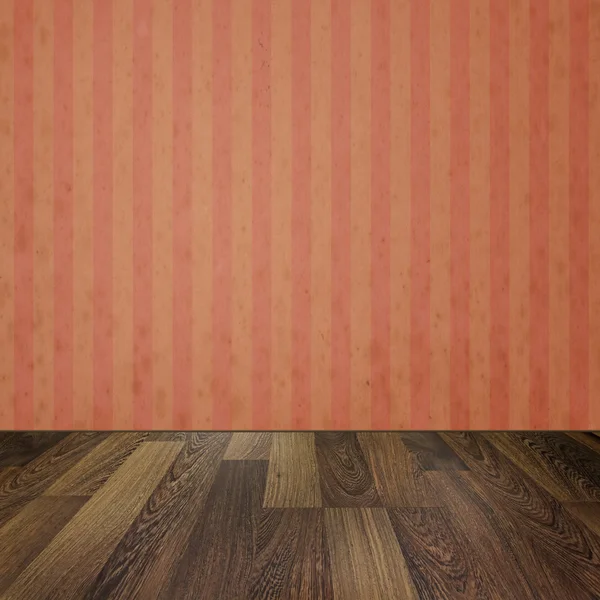 Empty room with wooden floors and vintage striped wallpaper