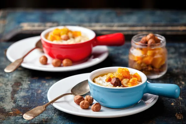 Oatmeal porridge with nuts and dried fruits