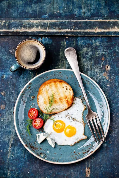 Traditional breakfast eggs with coffee