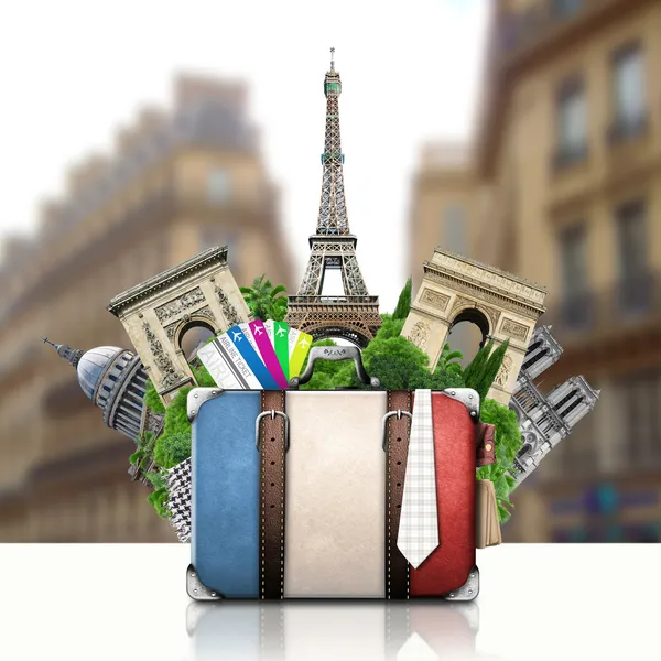 France and attractions of Paris, retro suitcase