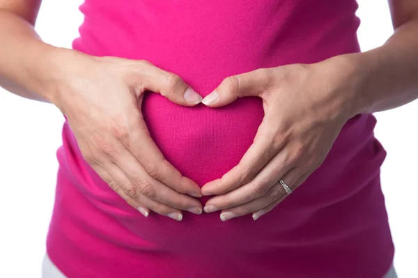 Heart Shaped Hands on a Pregnant Belly