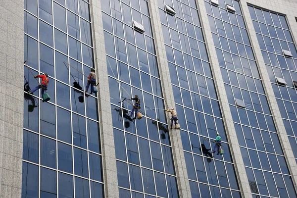Chongqing Changan Industry Company cleaning facades of the \