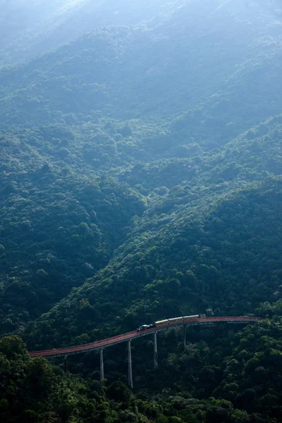 Shenzhen City, Guangdong Province, East Dameisha tea valley curved extension of the forests in the mountains train railway