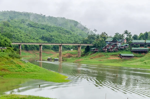 Rural life view of wooden Mon Bridge in Sangkhla Buri, Kanchanaburi Province , Thailand