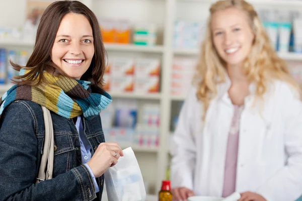 Happy Customer With A Pharmacist