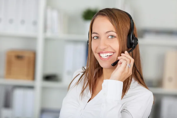 Customer Service Operator Communicating On Headset