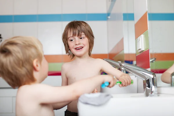 Two Little Boys In A Bathroom