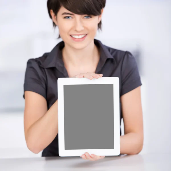 Woman presenting the screen of her tablet-pc