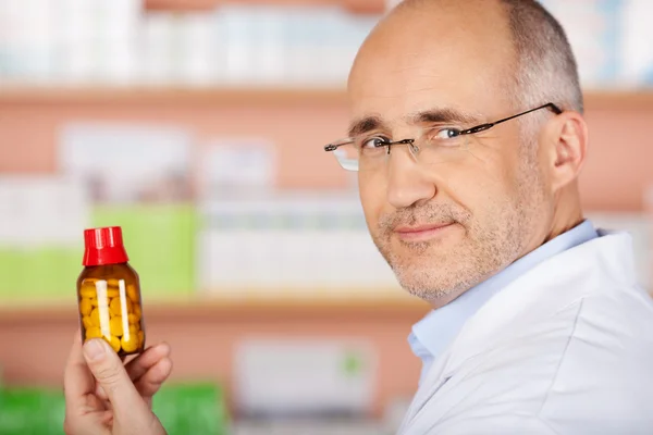 Mature male pharmacist