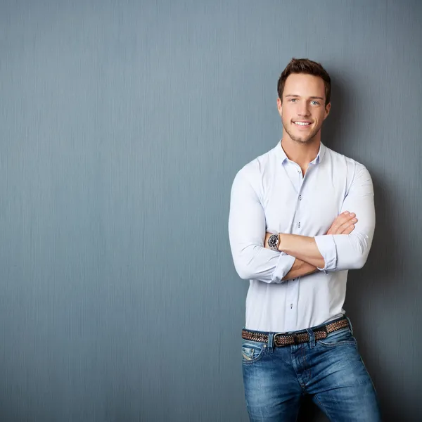 Portrait Of Smart Man Against gray background