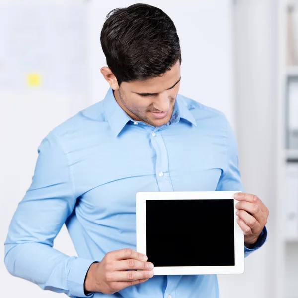 Businessman Holding Digital Tablet While Looking At It