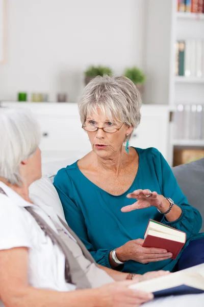Two senior women having a conversation