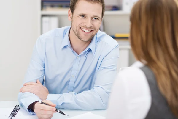 Businessman and woman in a meeting