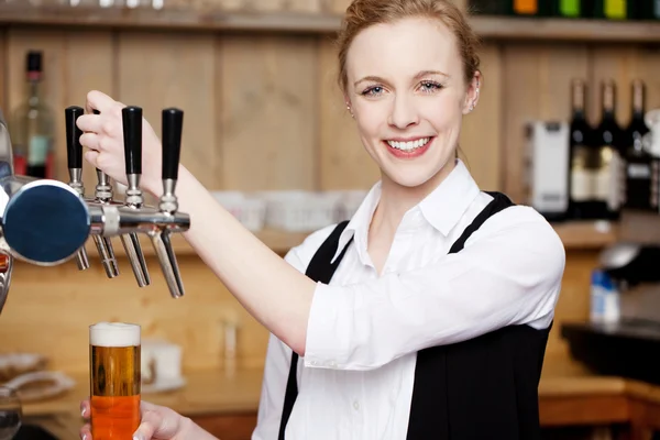 depositphotos_50289493-Female-bartender-filling-beer-in-glass.jpg
