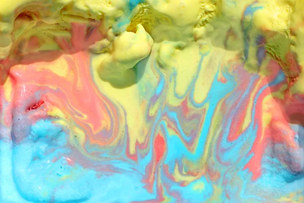 Melted Rainbow Ice Cream Background