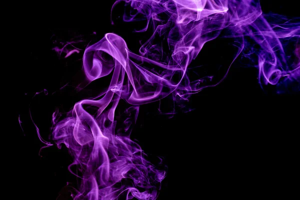 Violet color smoke on the black background