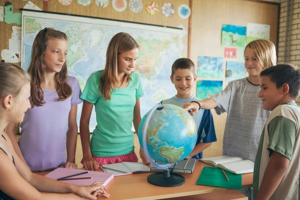 Schoolchildren in a Geography Lesson