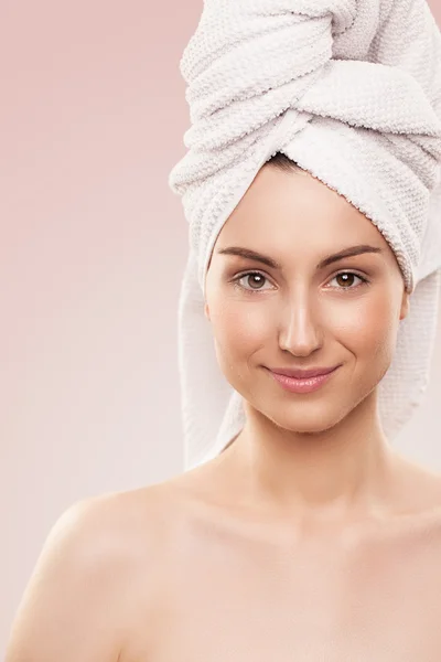 Smiling Woman With a Head Towel