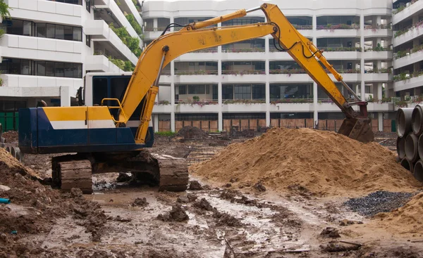 Excavator construction equipment park at worksite