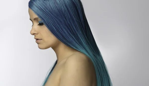 Young beautiful woman with blue hair