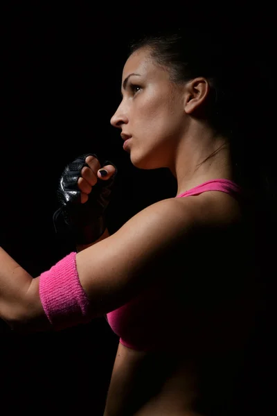 Beautiful fitness woman boxing