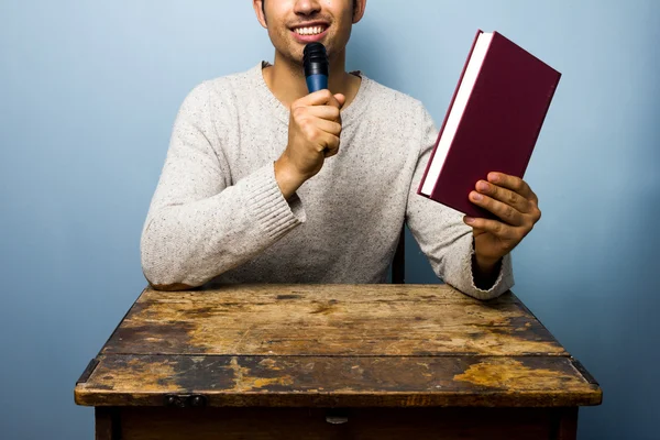 Author presenting his new book