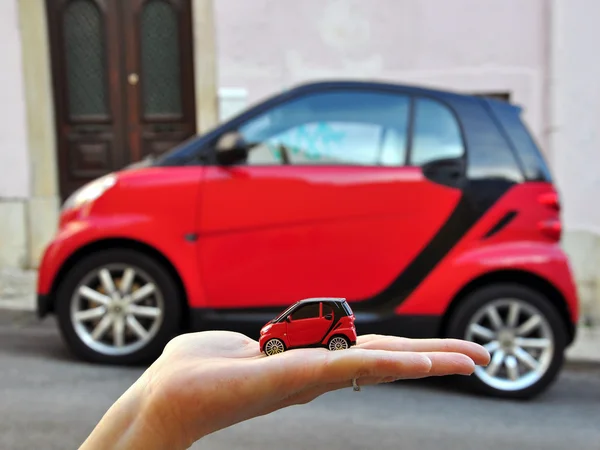 Red smart car: small the smaller