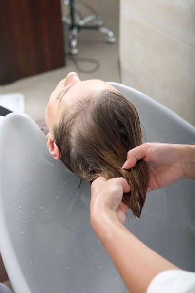 Washing hair in salon