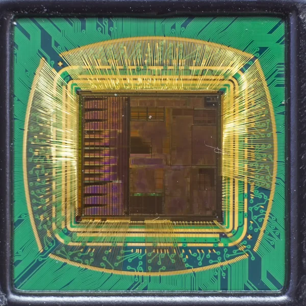 Open computer chip with gold wire connections