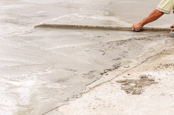 Worker decorative concrete slab