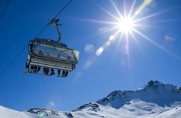 Skiers in a chairlift — Stock Photo #29564279
