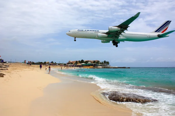 Jet landing over the beach in the Caribbean