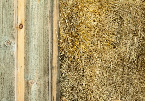 Hay bails in the barn for horse feed