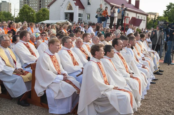 Catholic Bishop praying on Minsk Catholic church opening prior Roman Cardinal Tarcisio Bertone arrival