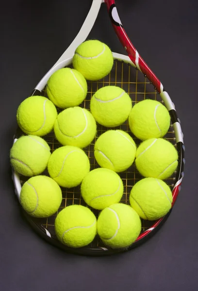 Tennis Racket with Tennis balls