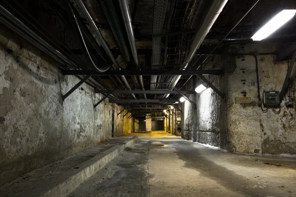 Inside an old industrial building, basement