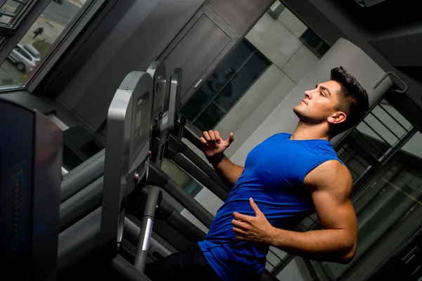 Running on treadmill in gym