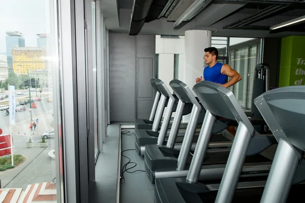 Man running on treadmill