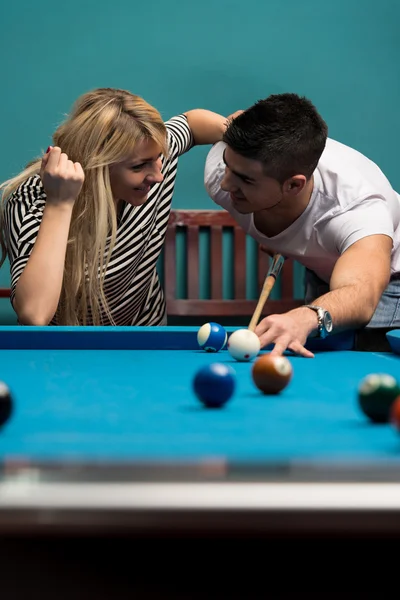 Boy And Girl Flirting On A Pool Game