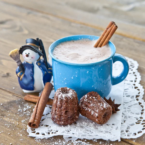 Hot chocolate with little cakes