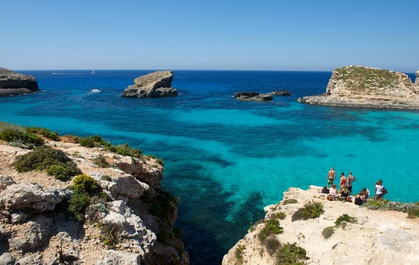 Beautiful crystal sea in Blue Lagoon in Malta, Comino island. Maltese nature. Maltese landscape. Emerald water. Summer holidays in Malta