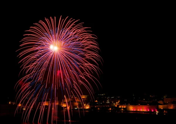 Fireworks, Colorful fireworks on the black sky background, Colorful fireworks of various colors over night sky with city view on the bottom, Malta, maltese fireworks, firework festival