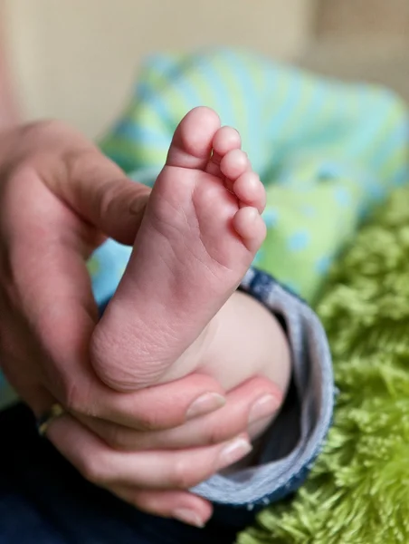 Small baby leg fragment photo, baby foot close up, baby foot close up conceptual photo, maternity, conceptual photo